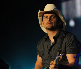 Man guitar cowboy hat microphone - a guitar free wallpaper