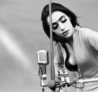 Woman microphone stand hair blowing - free vintage wallpaper