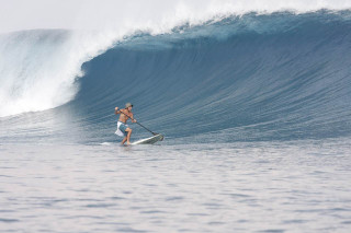 Man riding surfboard wave ocean - a paddle free wallpaper
