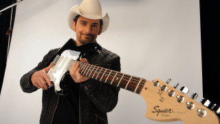 Man cowboy hat guitar microphone - a guitar in front free wallpaper