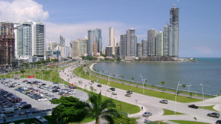 Cityscape tallbuildings river ruins nightlights - car free wallpaper