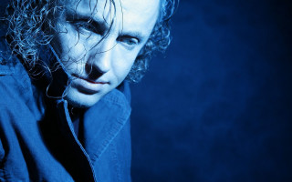 Man curly hair blue shirt 2 - david boyd free wallpaper