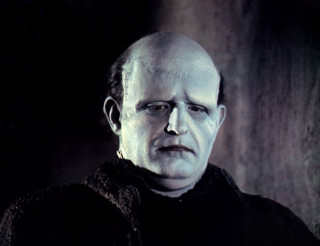 Bald man black sweater serious - a black sweater free wallpaper