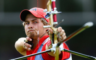 Man holding bow aiming red - aaron bohrod free wallpaper