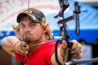 Man hat bow aiming arrow - aaron bohrod free wallpaper