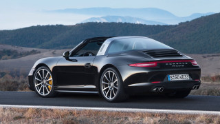 Black porsche sports car mountain - side profile free wallpaper