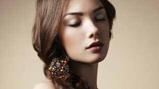 Woman braid earrings closed eyes - neutral free wallpaper