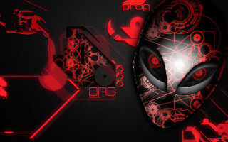 Red alien face black background - face and the words free wallpaper