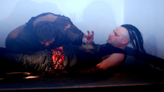 Dreadlocks man lying blood fire - action scene free wallpaper