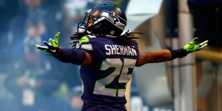 Football player arms outstretched hands - his hands out in the air free wallpaper