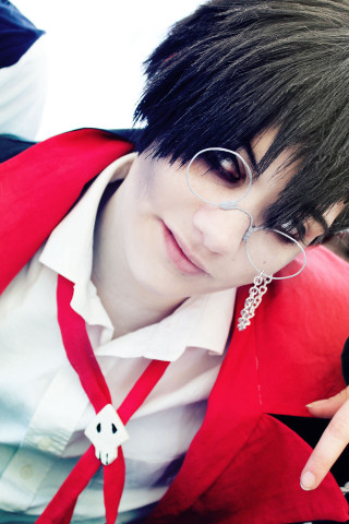 Man black hair glasses pointing - a red jacket free wallpaper