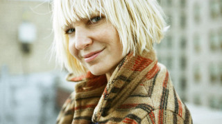 Blonde woman plaid coat smiling - visual art free wallpaper
