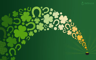 Green background shamrocks question marks - the middle free wallpaper