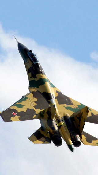 Camouflaged fighterjet cloudy sky redstar - free bird wallpaper