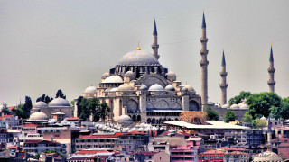 Large building spires city rooftops - roof free wallpaper