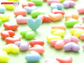 Heart shaped candy on table - the top free wallpaper