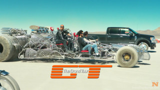 Motorcycle group desert monster truck - a group of people riding free wallpaper