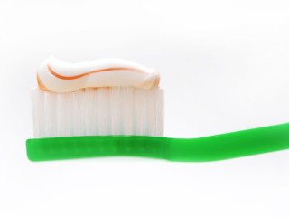 Toothbrush green toothpaste white toothbrush - a toothbrush free wallpaper