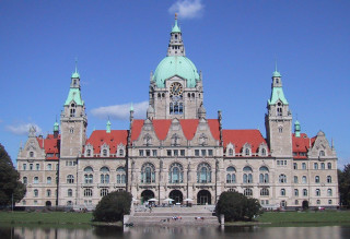 Large building tower clock lake - ernst free wallpaper