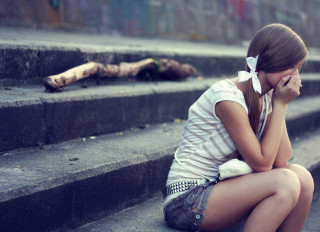Girl sitting on steps crying - the step free wallpaper