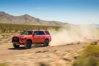 Red truck dirt road desert 2 - a dirt road in the desert free wallpaper