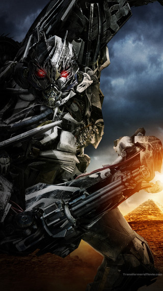 Robot gun sunset man suit - free sci-fi wallpaper