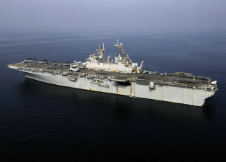 Large ship small ship ocean - a smaller ship in the background free wallpaper