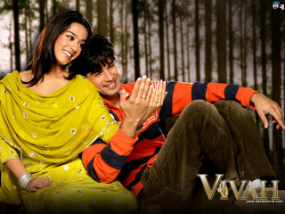 Man woman couch smiling waving - their hand together free wallpaper