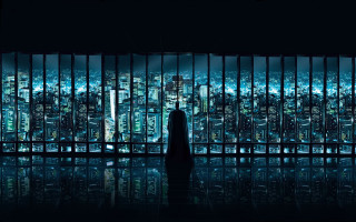 Person standing window city view 2 - a city view free wallpaper