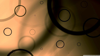 Close up wall circles blurry - a close up of a wall free wallpaper