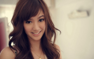Woman long hair smiling camera 14 - a photorealistic painting free wallpaper