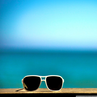 Sunglasses ocean ledge blue sky - near free wallpaper