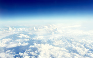Airplane window sky clouds blue 2 - cloud below free wallpaper