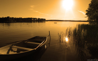 Boat sunset water dawn serene - free ship wallpaper