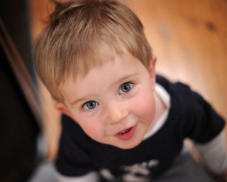 Little boy black white shirt - free portrait wallpaper