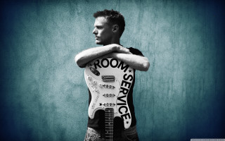 Man holding guitar shirt moon - a guitar free wallpaper