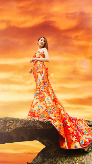 Woman long dress rock sunset 2 - a rock free wallpaper