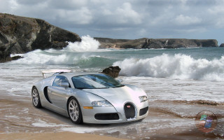 Silver car beach ocean rocks - a silver car free wallpaper