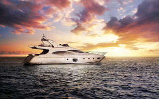Boat sunset clouds water dawn 2 - the water below free wallpaper