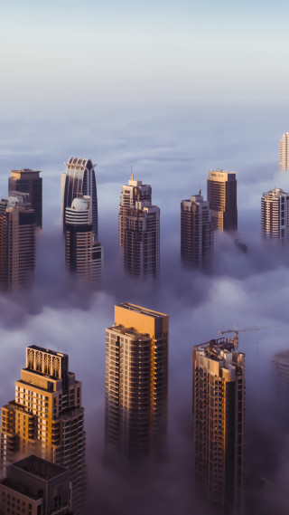 City in the clouds skyscrapers - a city free wallpaper