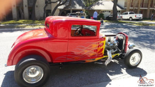 Red car flames parking lot - a few person free wallpaper