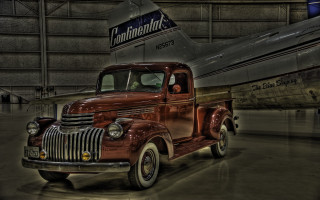 Vintage truck garage plane background - a plane in the background free wallpaper