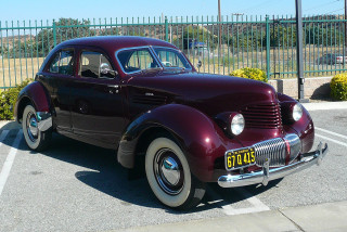 Classic car parking lot fence - a fence and a fenced in area free wallpaper
