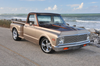 Tan truck ocean rocks blue - the side of the road near the ocean free wallpaper