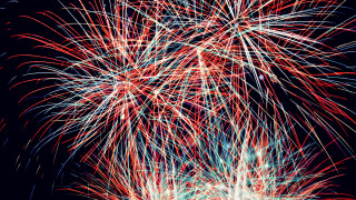 Firework display black background red - free new year wallpaper