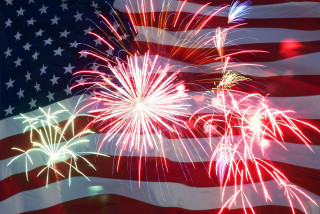 Large american flag fireworks background - explosion free wallpaper