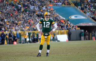 Football player field crowd watching - aaron bohrod free wallpaper