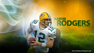Football player holding ball green - a football player holding free wallpaper