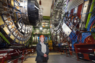 Man standing room wires equipment - complex free wallpaper