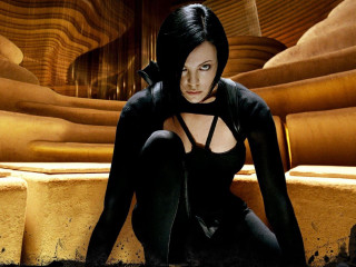 Woman black outfit sitting ledge - a black outfit free wallpaper for desktop